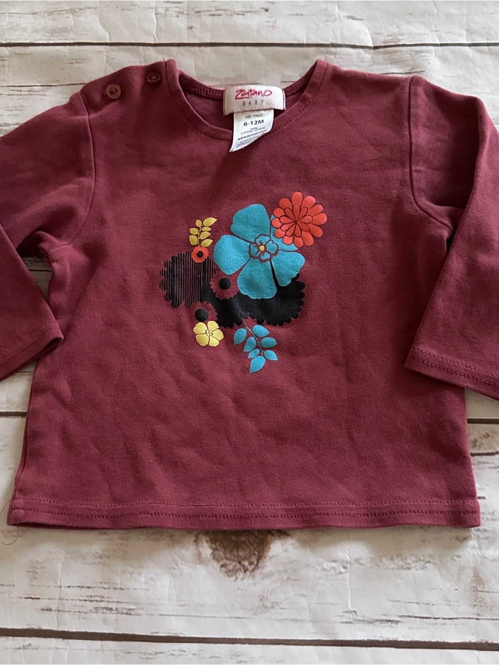 Zutano rust floral top